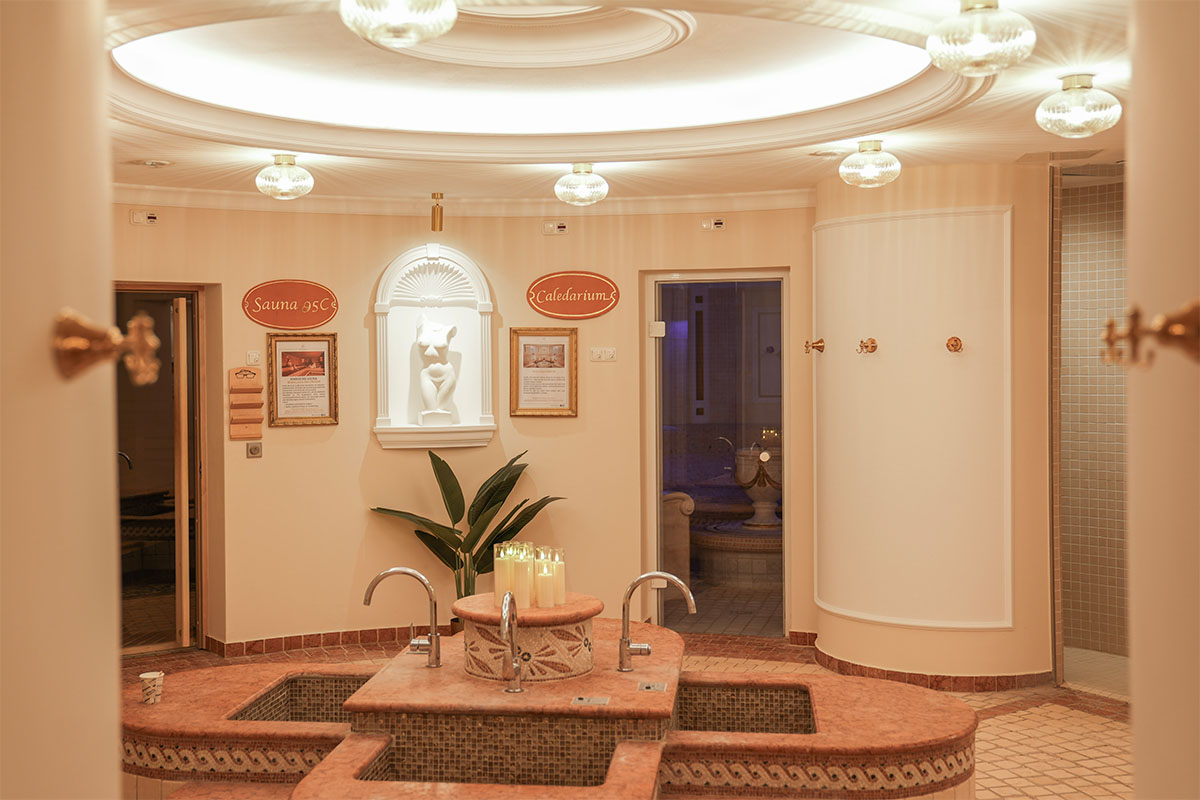 Interior view of the sauna area with caldarium and stylish décor at the Rugard Thermal Strandhotel